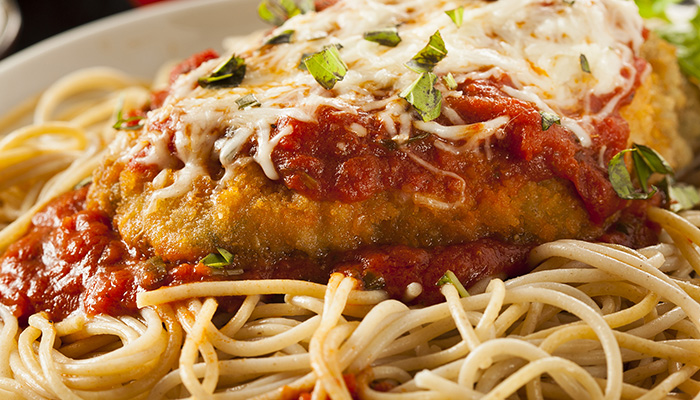 Chicken Parmesan with spaghetti from Primo's pizza, the best italian pasta in Johnstown, PA