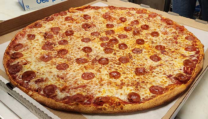 X-tra XL large specialty pepperoni served only at Primo's Pizza restaurant pizzeria in Johnstown, Pennsylvania